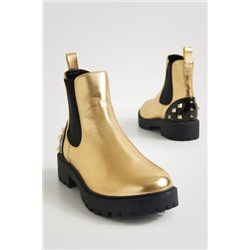 Botines biker oro tachuelas