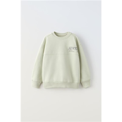 SUDADERA TEXTO BORDADO ETIQUETA