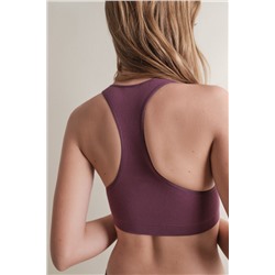 Top deportivo seamless canalé burgundy