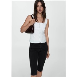Jeans slim capri costuras decorativas