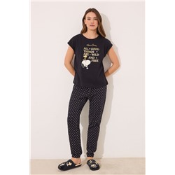 Pijama largo 100% algodón Snoopy negro