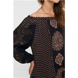 Blusa loose cuello barco