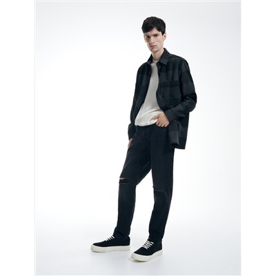Jeans im Carrot-Fit in Used-Optik