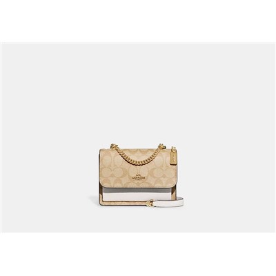 Mini Klare Crossbody In Signature Canvas