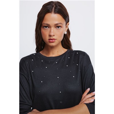 Camiseta tachas posicionadas