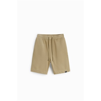 TEXTURED OTTOMAN BERMUDA SHORTS