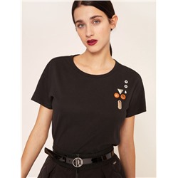 STUD AND GROMMET CUTOUT TEE