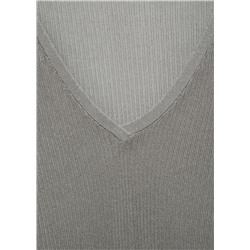 Camiseta semitransparente cuello polo