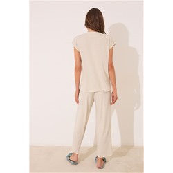 Conjunto pantalón y camiseta marfil lurex