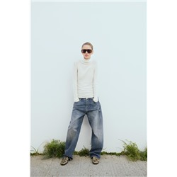SEMI-SHEER DELICATE COTTON TOP WITH CUFFS AND SEAM DETAIL