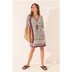 Camisola midi estampado hojas