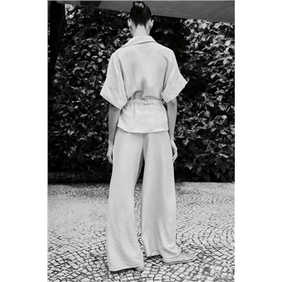 WIDE-LEG TROUSERS WITH ELASTIC WAIST