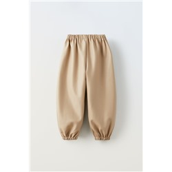 PANTALÓN PARACHUTE EFECTO PIEL