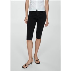 Jeans slim capri costuras decorativas