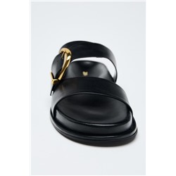 BUCKLED FLAT SANDALS