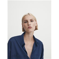 Camisa algodón bolsillos detalle mangas