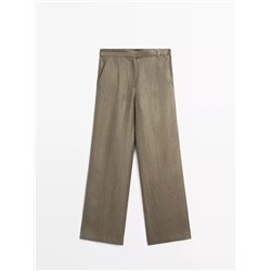 100% linen striped trousers with buckle detail