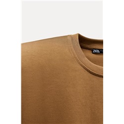 TOP WITH PADDED SHOULDERS AND LABEL