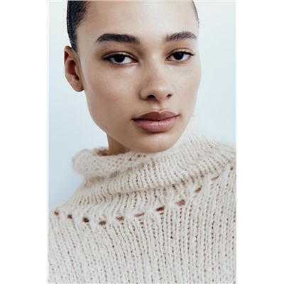 SWEATER WITH ROLLED-UP DETAIL