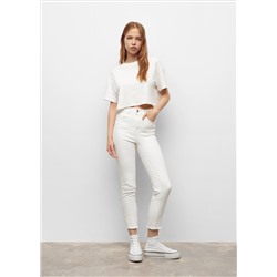 Jeans slim bajo deshilachado