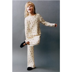 TEXTURED FLORAL PRINT TROUSERS