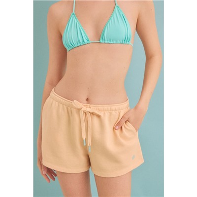 Pantalón corto felpa naranja