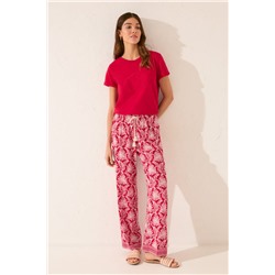 Pantalón largo viscosa estampado hojas rojo