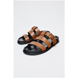 BUCKLED FLAT LEATHER SANDALS