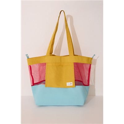 Bolso mesh y nylon estampado blanco