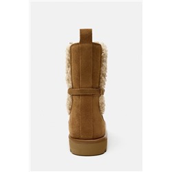 FAUX SHEARLING AND LEATHER FLAT ANKLE BOOTS