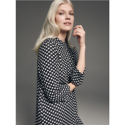 Gepunktetes Kleid