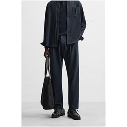 TEXTURED PLEATED TROUSERS