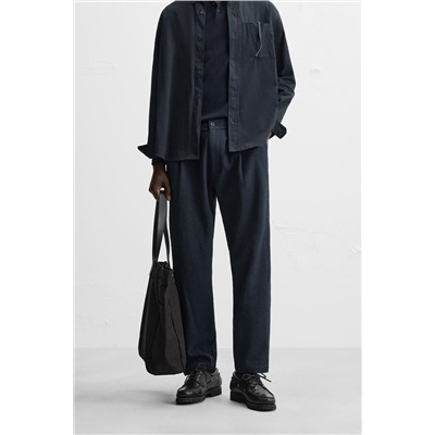 TEXTURED PLEATED TROUSERS