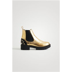 Botines biker oro tachuelas