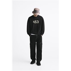 SUDADERA TEXTO ESTAMPADO
