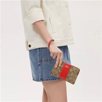 Corner Zip Wristlet In Signature Canvas