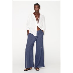 WIDE-LEG WRAP TROUSERS WITH SIDE OPENINGS