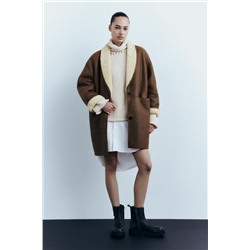 SWEATER WITH ROLLED-UP DETAIL