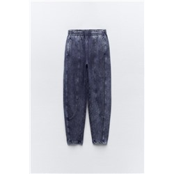 FADED-EFFECT CARROT FIT PLUSH TROUSERS