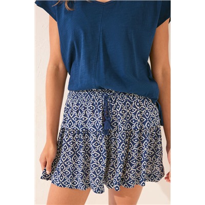 Pantalón corto estampado sello azul