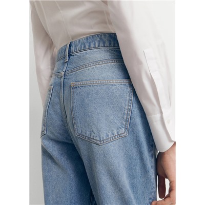 Jeans rectos bajo vuelto