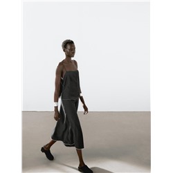 Midi skirt with topstitching detail on the hem