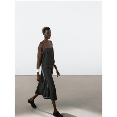 Midi skirt with topstitching detail on the hem