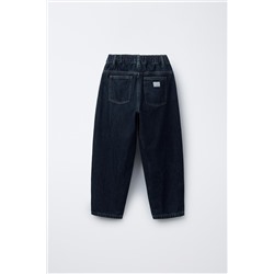 PLEATED BALLOON-FIT DENIM TROUSERS