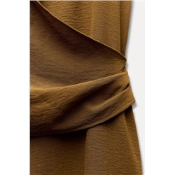 ASYMMETRIC FLOWING TOP