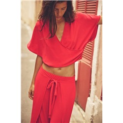 FLOWING WRAP TOP