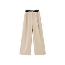 Pantalón palazzo de lana Beige