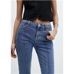 Jeans capri costuras decorativas