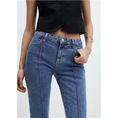 Jeans capri costuras decorativas
