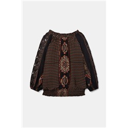 Blusa loose cuello barco